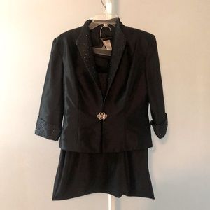 Women’s black tie gown with sequenced jacket